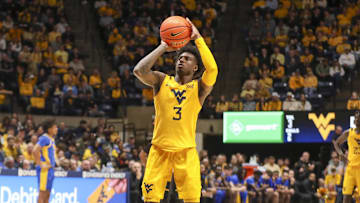 Nov 13, 2025; Morgantown, West Virginia, USA; West Virginia Mountaineers guard Honor Huff (3) shoots a free throw after a technical foul was called during the second half against the Pittsburgh Panthers at WVU Coliseum. Mandatory Credit: Ben Queen-Imagn Images