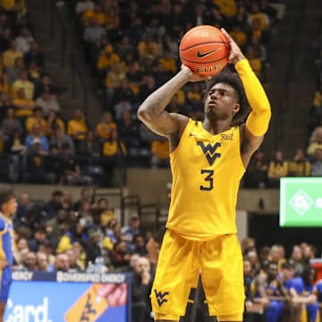 Nov 13, 2025; Morgantown, West Virginia, USA; West Virginia Mountaineers guard Honor Huff (3) shoots a free throw after a technical foul was called during the second half against the Pittsburgh Panthers at WVU Coliseum. Mandatory Credit: Ben Queen-Imagn Images