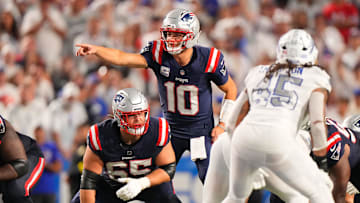 Oct 5, 2025; Orchard Park, New York, USA; New England Patriots quarterback Drake Maye (10) calls out signals prior to the snap against the Buffalo Bills during the first half at Highmark Stadium. Mandatory Credit: Gregory Fisher-Imagn Images