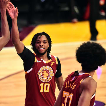 Feb 19, 2022; Cleveland, OH, USA; Team Cavs player Darius Garland (10) and player Evan Mobley (4) and player Jarrett Allen (31) celebrate after a play in the Taco Bell Skills Challenge against Team Rooks and Team Antetokounmpo during the 2022 NBA All-Star Saturday Night at Rocket Mortgage Field House. Mandatory Credit: Ken Blaze-USA TODAY Sports