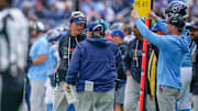 Tennessee Titans interim coach Mike McCoy works the sideline during the second quarter against the New England Patriots at Nissan Stadium in Nashville, Tenn., Sunday, Oct. 19, 2025.
