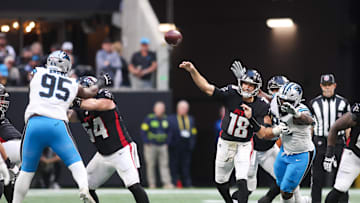Nov 16, 2025; Atlanta, Georgia, USA; Atlanta Falcons quarterback Kirk Cousins (18) is pressured to throw in the fourth quarter against the Carolina Panthers at Mercedes-Benz Stadium. Mandatory Credit: Brett Davis-Imagn Images