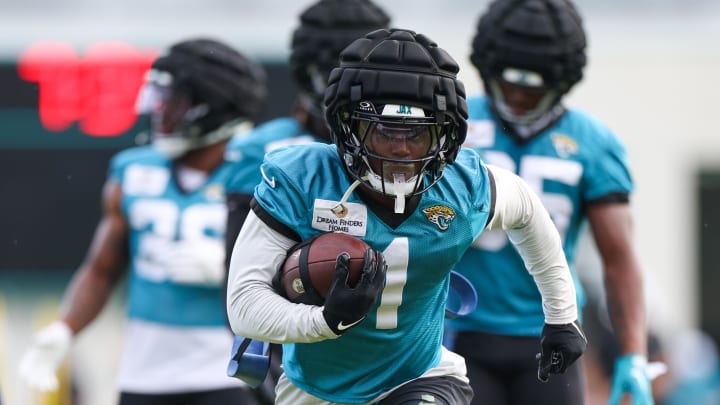 Jul 26, 2024; Jacksonville, FL, USA; Jacksonville Jaguars running back Travis Etienne Jr. (1) participates in training camp at Miller Electric Center. Mandatory Credit: Nathan Ray Seebeck-USA TODAY Sports