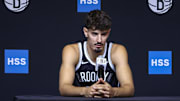 Sep 23, 2025; Brooklyn, NY, USA;  Brooklyn Nets guard Ben Saraf (77) speaks at Media Day. Mandatory Credit: Wendell Cruz-Imagn Images