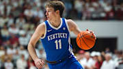 Feb 22, 2025; Tuscaloosa, Alabama, USA; Kentucky Wildcats guard Travis Perry (11) drives the ball against the Alabama Crimson Tide during the first half at Coleman Coliseum. Mandatory Credit: Will McLelland-Imagn Images