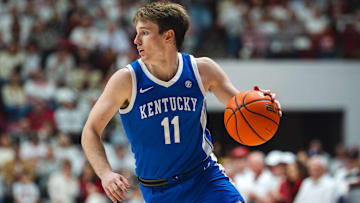 Feb 22, 2025; Tuscaloosa, Alabama, USA; Kentucky Wildcats guard Travis Perry (11) drives the ball against the Alabama Crimson Tide during the first half at Coleman Coliseum. Mandatory Credit: Will McLelland-Imagn Images