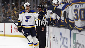 Nov 16, 2024; Boston, Massachusetts, USA; St. Louis Blues center Radek Faksa (12) is congratulated at the bench after scoring against the Boston Bruins during the first period at TD Garden. Mandatory Credit: Winslow Townson-Imagn Images