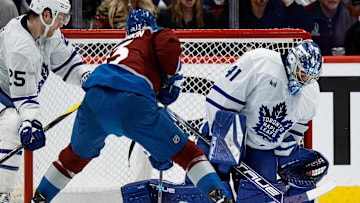 Mar 8, 2025; Denver, Colorado, USA; Toronto Maple Leafs goaltender Anthony Stolarz (41) makes a save against Colorado Avalanche right wing Valeri Nichushkin (13) in the third period at Ball Arena. Mandatory Credit: Isaiah J. Downing-Imagn Images