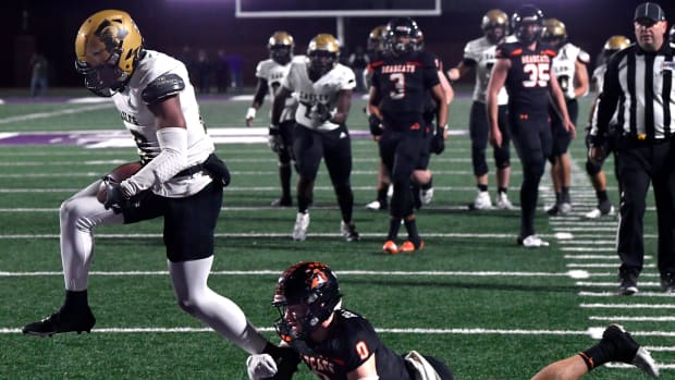 Abilene's Ryland Bradford scores on Aledo in the 5A Division I regional final on Dec. 1, 2023. 