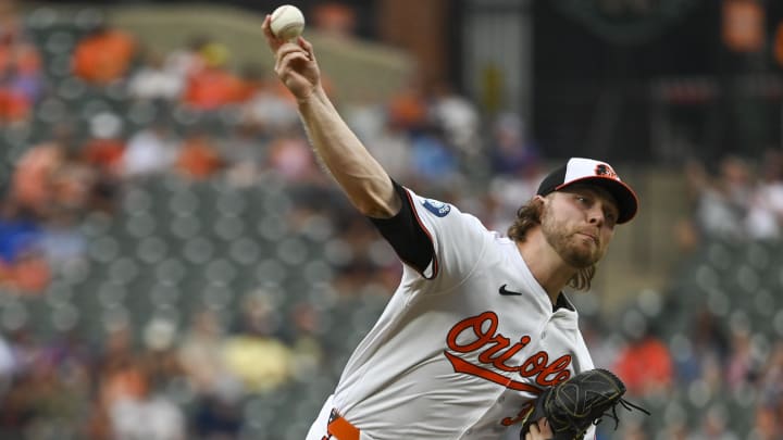 Jul 30, 2024; Baltimore, Maryland, USA;  Baltimore Orioles pitcher Corbin Burnes (39) delivers a first inning pitch against the Toronto Blue Jays at Oriole Park at Camden Yards.