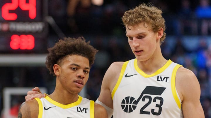 Nov 4, 2023; Minneapolis, Minnesota, USA; Utah Jazz forward Lauri Markkanen (23) and guard Keyonte George (3) talk during a break against the Minnesota Timberwolves in the fourth quarter at Target Center. Mandatory Credit: Matt Blewett-Imagn Images