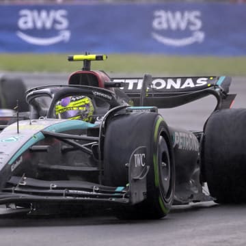 Jun 9, 2024; Montreal, Quebec, CAN; Mercedes driver Lewis Hamilton (GBR) races ahead of Ferrari driver Charles Leclerc (MCO) during the Canadian Grand Prix at Circuit Gilles Villeneuve. Mandatory Credit: Eric Bolte-USA TODAY Sports