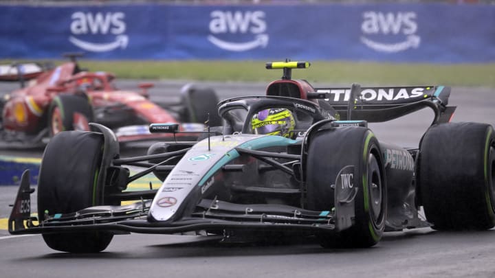 Jun 9, 2024; Montreal, Quebec, CAN; Mercedes driver Lewis Hamilton (GBR) races ahead of Ferrari driver Charles Leclerc (MCO) during the Canadian Grand Prix at Circuit Gilles Villeneuve. Mandatory Credit: Eric Bolte-USA TODAY Sports