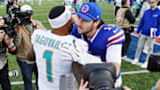 Buffalo Bills quarterback Josh Allen (17) greets Miami Dolphins quarterback Tua Tagovailoa (1) after a game at Highmark Stadium. 