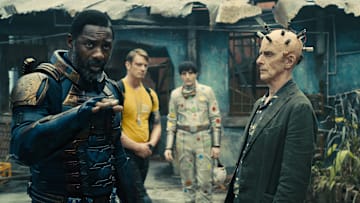 (L-r) IDRIS ELBA as Bloodsport, JOEL KINNAMAN as Colonel Rich Flag, DAVID DASTMALCHIAN as Polka-Dot Man and PETER CAPALDI as Thinker in Warner Bros. Pictures’ superhero action adventure “THE SUICIDE SQUAD,” a Warner Bros. Pictures release. Courtesy of Warner Bros. Pictures/™ & © DC Comics. © 2021 Warner Bros. Entertainment Inc. All Rights Reserved.