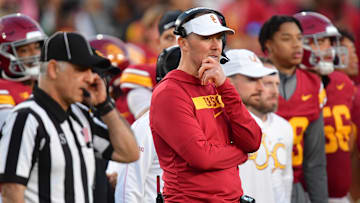 Nov 16, 2024; Los Angeles, California, USA; Southern California Trojans head coach Lincoln Riley watches game action against the Nebraska Cornhuskers during the second half at the Los Angeles Memorial Coliseum. Mandatory Credit: Gary A. Vasquez-Imagn Images