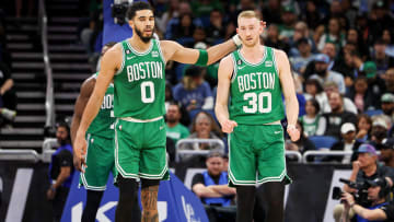 Jan 23, 2023; Orlando, Florida, USA;  Boston Celtics forward Jayson Tatum (0) and forward Sam Hauser (30) react after a play against the Orlando Magic in the second quarter at Amway Center. Mandatory Credit: Nathan Ray Seebeck-USA TODAY Sports