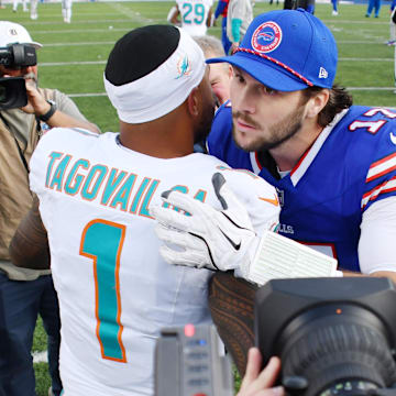 Buffalo Bills quarterback Josh Allen (17) greets Miami Dolphins quarterback Tua Tagovailoa (1) after a game at Highmark Stadium after a 2024 game.