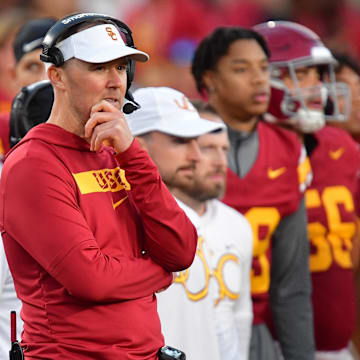 Nov 16, 2024; Los Angeles, California, USA; Southern California Trojans head coach Lincoln Riley watches game action against the Nebraska Cornhuskers during the second half at the Los Angeles Memorial Coliseum. 
