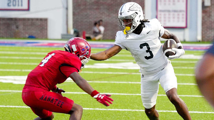 Bosco's wide receiver Daniel Odom (#3) was one of four receivers who collected touchdown passes from Koa Malau'ulu in Friday's 27-14 win over Santa Margarita. Here Odom is forced out of bounds by Manatee's defensive back Zyaire Green (#10) in the opening game of the season in Florida. Bosco's wide receiver Daniel Odom (#3) was one of four receivers who collected touchdown passes from Koa Malau'ulu in Friday's 27-14 win over Santa Margarita. Here Odom is forced out of bounds by Manatee's defensive back Zyaire Green (#10) in the opening game of the season in Florida.
