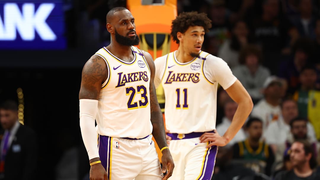 Nov 26, 2024; Phoenix, Arizona, USA; Los Angeles Lakers forward LeBron James (23) and center Jaxson Hayes (11) against the Phoenix Suns during an NBA Cup game at Footprint Center. Mandatory Credit: Mark J. Rebilas-Imagn Images