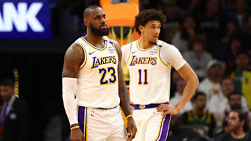 Nov 26, 2024; Phoenix, Arizona, USA; Los Angeles Lakers forward LeBron James (23) and center Jaxson Hayes (11) against the Phoenix Suns during an NBA Cup game at Footprint Center. Mandatory Credit: Mark J. Rebilas-Imagn Images