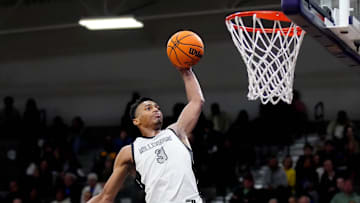 Millennium forward Cameron Holmes (3) dunks against Sunnyslope during a game at Millennium High School in Goodyear on Jan. 23, 2025.