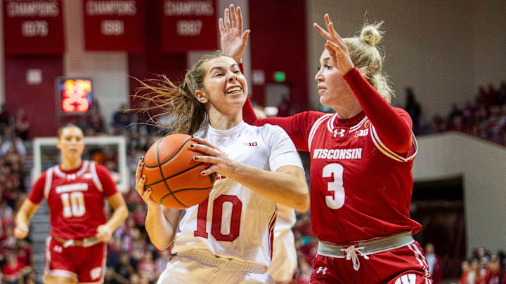 Indiana's Shay Ciezki (10) looks to score past Wisconsin's Tess Myers (3) during the Indiana versus Wisconsin women's basketball game at Simon Skjodt Assembly Hall on Saturday, Dec. 28, 2024.