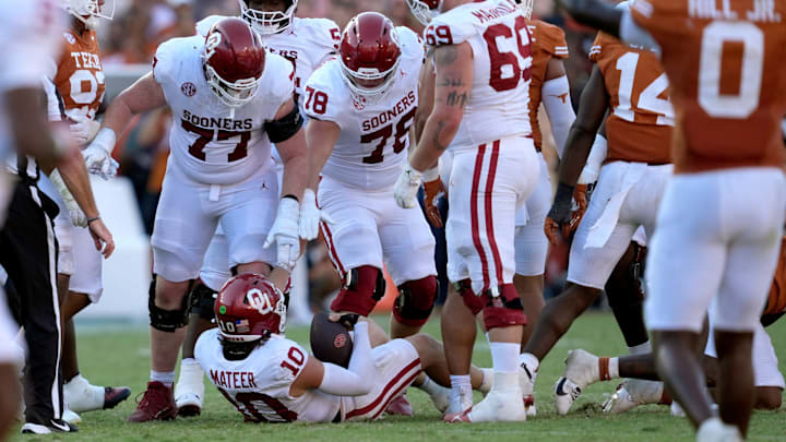 The offensive line looks to pick up Oklahoma quarterback John Mateer after allowing a sack against Texas. The offensive line looks to pick up Oklahoma quarterback John Mateer after allowing a sack against Texas.