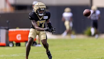 Aug 1, 2023; Metairie, LA, USA;  New Orleans Saints wide receiver A.T. Perry (17) catches passes during  training camp at the Ochsner Sports Performance Center. Mandatory Credit: Stephen Lew-USA TODAY Sports