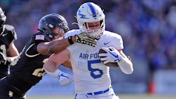 Nov 2, 2024; West Point, New York, USA; Air Force Falcons running back Dylan Carson (5) runs with the ball against the Army Black Knights during the first half at Michie Stadium.