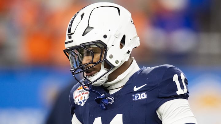 Dec 31, 2024; Glendale, AZ, USA; Penn State Nittany Lions defensive end Abdul Carter (11) against the Boise State Broncos in the Fiesta Bowl at State Farm Stadium. Mandatory Credit: Mark J. Rebilas-Imagn Images Dec 31, 2024; Glendale, AZ, USA; Penn State Nittany Lions defensive end Abdul Carter (11) against the Boise State Broncos in the Fiesta Bowl at State Farm Stadium. Mandatory Credit: Mark J. Rebilas-Imagn Images