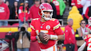 Nov 23, 2025; Kansas City, Missouri, USA; Kansas City Chiefs quarterback Patrick Mahomes (15) looks to pass against the Indianapolis Colts in overtime at GEHA Field at Arrowhead Stadium. Mandatory Credit: Denny Medley-Imagn Images