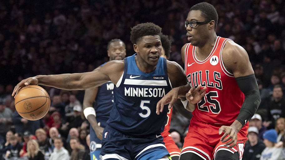 Timberwolves guard Anthony Edwards dribbles the ball past Chicago Bulls forward Jalen Smith.