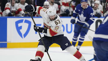 May 5, 2025; Toronto, Ontario, CAN; Florida Panthers forward Brad Marchand (63) controls the puck against the Toronto Maple Leafs during the second period of the second round of the 2025 Stanley Cup Playoffs at Scotiabank Arena. Mandatory Credit: John E. Sokolowski-Imagn Images