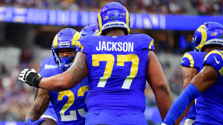 Dec 17, 2023; Inglewood, California, USA; Los Angeles Rams running back Kyren Williams (23) celebrates his touchdown scored against the Washington Commanders with offensive tackle Alaric Jackson (77) during the first half at SoFi Stadium. Mandatory Credit: Gary A. Vasquez-USA TODAY Sports