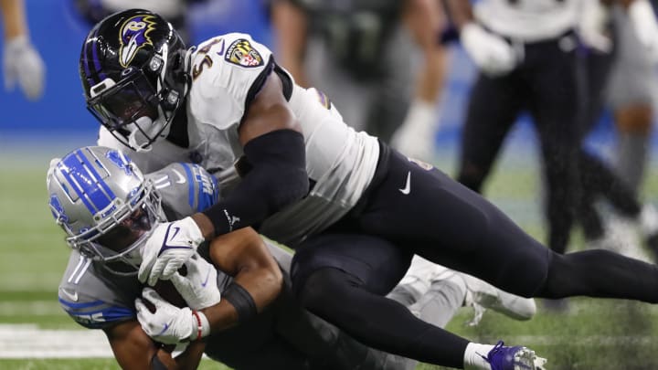 Sep 26, 2021; Detroit, Michigan, USA; Detroit Lions wide receiver Kalif Raymond (11) gets tackled by Baltimore Ravens outside linebacker Tyus Bowser (54) during the fourth quarter at Ford Field. Mandatory Credit: Raj Mehta-USA TODAY Sports