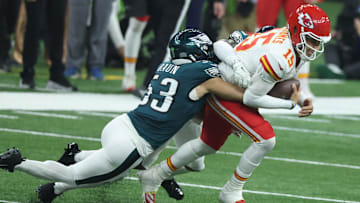 Feb 9, 2025; New Orleans, LA, USA;  Kansas City Chiefs quarterback Patrick Mahomes (15) is tackled by Philadelphia Eagles linebacker Zack Baun (53) in Super Bowl LIX between the Philadelphia Eagles and the Kansas City Chiefs at Ceasars Superdome. 