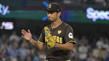 Oct 6, 2024; Los Angeles, California, USA; San Diego Padres pitcher Yu Darvish (11) reacts after an out in the seventh inning against the Los Angeles Dodgers during game two of the NLDS for the 2024 MLB Playoffs at Dodger Stadium. Mandatory Credit: Jayne Kamin-Oncea-Imagn Images