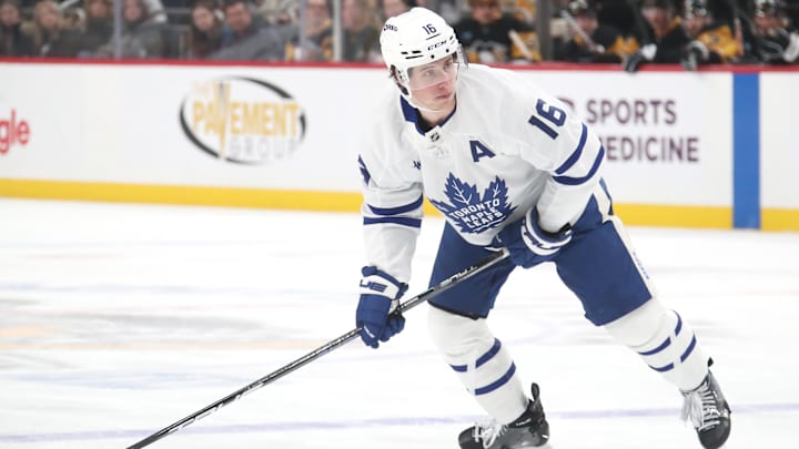 Mar 2, 2025; Pittsburgh, Pennsylvania, USA; Toronto Maple Leafs right wing Mitch Marner (16) handles the puck against the Pittsburgh Penguins during the second period at PPG Paints Arena. Mandatory Credit: Charles LeClaire-Imagn Images Mar 2, 2025; Pittsburgh, Pennsylvania, USA; Toronto Maple Leafs right wing Mitch Marner (16) handles the puck against the Pittsburgh Penguins during the second period at PPG Paints Arena. Mandatory Credit: Charles LeClaire-Imagn Images
