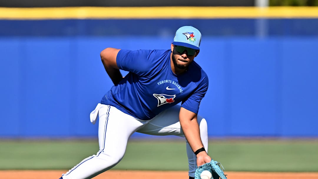 Feb 13, 2026; Dunedin, FL, USA; Toronto Blue Jays infielder Leo Jiménez (49) fields a ground ball during spring training at the Bobby Mattick Training Center at Englebert Complex. Mandatory Credit: Jonathan Dyer-Imagn Images