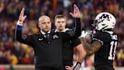 Nov 1, 2025; Minneapolis, Minnesota, USA; Minnesota Golden Gophers head coach P.J. Fleck reacts during overtime against the Michigan State Spartans at Huntington Bank Stadium. Mandatory Credit: Matt Krohn-Imagn Images