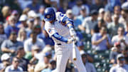 Chicago Cubs second baseman Nico Hoerner (2) singles against the Oakland Athletics during the second inning at Wrigley Field in 2024.