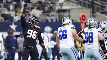 Nov 18, 2024; Arlington, Texas, USA; Houston Texans defensive end Denico Autry (96) reacts after a sack during the second half against the Dallas Cowboys at AT&T Stadium. Mandatory Credit: Kevin Jairaj-Imagn Images