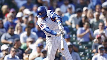 Chicago Cubs second baseman Nico Hoerner (2) singles against the Oakland Athletics during the second inning at Wrigley Field in 2024.