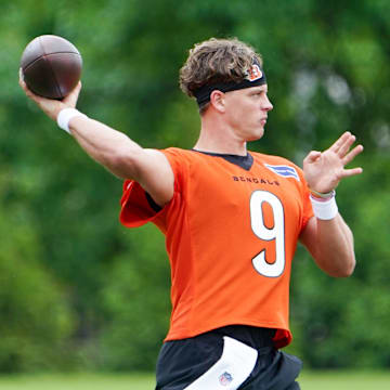 Cincinnati Bengals quarterback Joe Burrow (9) runs through drills during practice, Tuesday, May 13, 2025, at Kettering Health Practice Fields in Downtown Cincinnati.