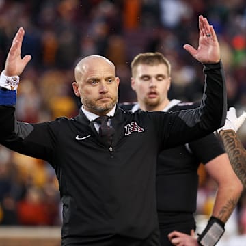 Nov 1, 2025; Minneapolis, Minnesota, USA; Minnesota Golden Gophers head coach P.J. Fleck reacts during overtime against the Michigan State Spartans at Huntington Bank Stadium. Mandatory Credit: Matt Krohn-Imagn Images