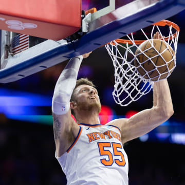May 2, 2024; Philadelphia, Pennsylvania, USA; New York Knicks center Isaiah Hartenstein (55) dunks the ball against the Philadelphia 76ers during the first half of game six of the first round for the 2024 NBA playoffs at Wells Fargo Center. Mandatory Credit: Bill Streicher-USA TODAY Sports