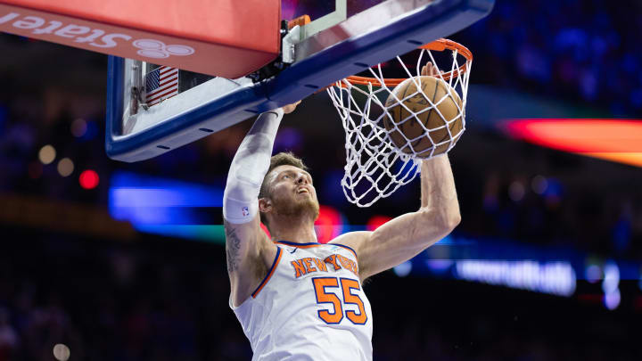 May 2, 2024; Philadelphia, Pennsylvania, USA; New York Knicks center Isaiah Hartenstein (55) dunks the ball against the Philadelphia 76ers during the first half of game six of the first round for the 2024 NBA playoffs at Wells Fargo Center. Mandatory Credit: Bill Streicher-USA TODAY Sports