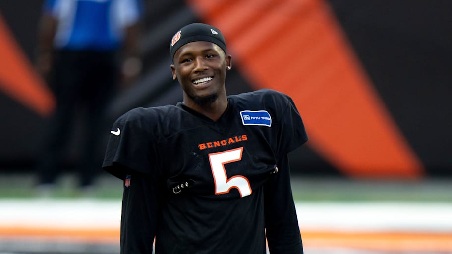 Cincinnati Bengals wide receiver Tee Higgins (5) smiles during Bengals Camp practice at Paycor Stadium in Cincinnati on Aug. 2, 2025. | Albert Cesare/The Enquirer / USA TODAY NETWORK via Imagn Images